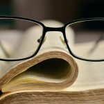 glasses on book
